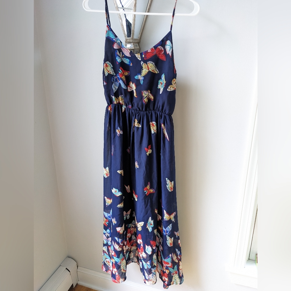 Women's butterfly dress. Navy. Adjustable straps. Lined. Size S. Worn once.